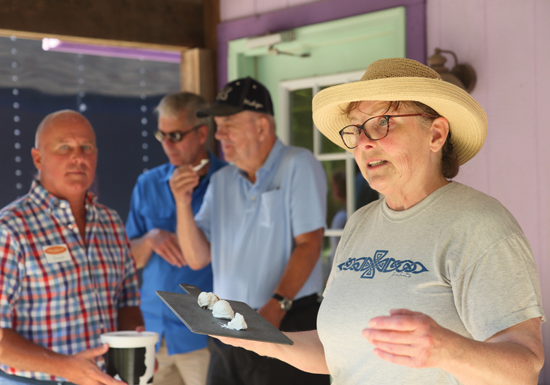 Cathy Halinski owner of Evergreen Lane Farm and Creamery talks to participants about her cheeses. 