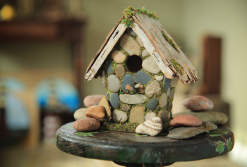 Beach stone birdhouse