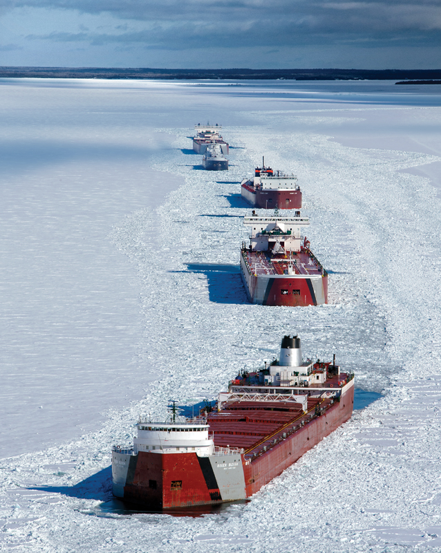 A convoy of “lakers” wait for an icebreaker escort in the St. Mary's River.