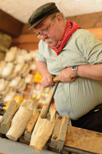 Dutch wooden shoes are carved at Dutch Village