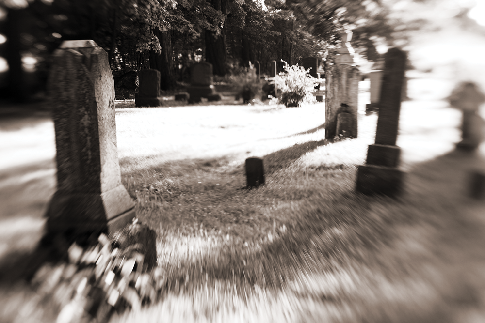 Graveyard with blurred vision