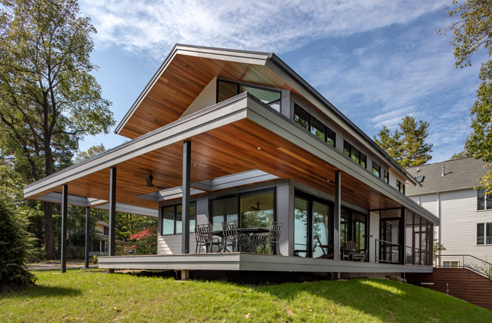 The Gun Lake cottage was oriented on the site so its length is facing the water.