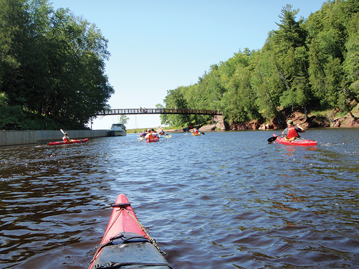 Kayaking or canoeing the Black River provides an exhilarating way to explore the area’s outdoor offerings.