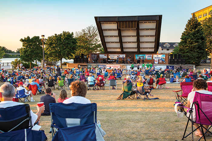 The riverside Wenonah Park bandshell is a favorite spot to watch summer concerts and gather for the nearby Bay City Fireworks Festival (June 29-July1, 2023).